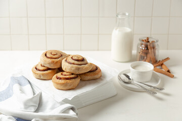 cinnamon buns and milk bottle