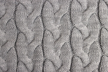 Knitted wool fabric with braids