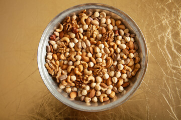 mixed nuts in copper plate