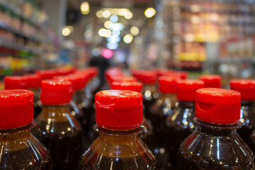 bottles of soy sauce lined up on the Japanese market.