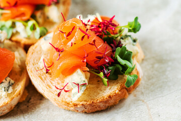 canape with salted salmon and herbs