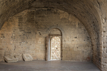 cold and spacious stone room of a medieval castle