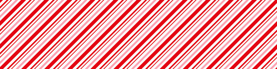 Candy cane Christmas background, peppermint diagonal stripes print seamless pattern.
