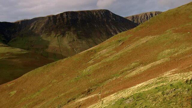 Drone footage during Autumn Winter light of Knott Rigg in the English Lake District, uk.