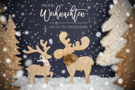 German Calligraphy Frohe Weihnachten Und Ein Gutes Neues Jahr Means Merry Christmas And A Happy New Year. Moose Couple In Love With Black Background. Christmas Trees With Snow And Snowflakes