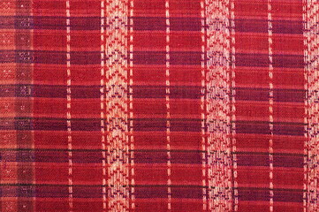 More than 100 years old colorful thai handcraft peruvian style rug surface old vintage torn conservation Made from natural materials Chemical free close up.