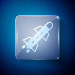 White Rocket icon isolated on blue background. Square glass panels. Vector.