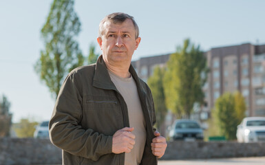 Psychology portrait of mature man, emotion on a face, stress, crisis of middle age