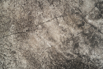 the aged concrete cement plaster wall texture with the cracked pattern