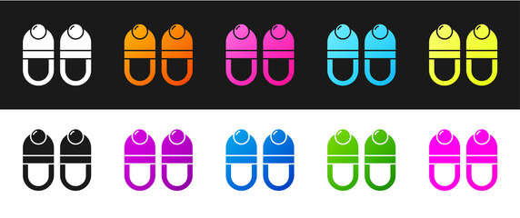 Set Slippers icon isolated on black and white background. Flip flops sign. Vector.