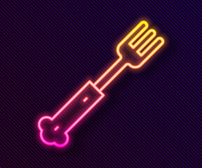 Glowing neon line Fork icon isolated on black background. Cutlery symbol. Vector.