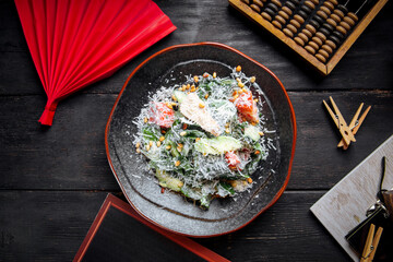 Chicken salad with lettuce and pine nuts