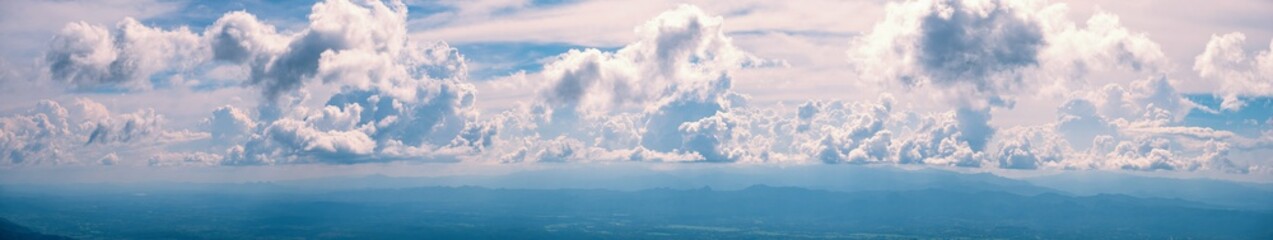 Blue sky with white clouds background.