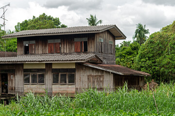 Old wooden house by the river Nakhon Pathom Province  Thailand