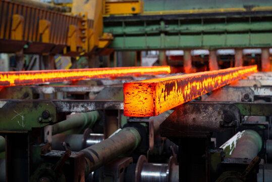 Steel production in electric furnaces. Sparks of molten steel. Electric arc furnace shop . Metallurgical production, heavy industry, engineering, steelmaking