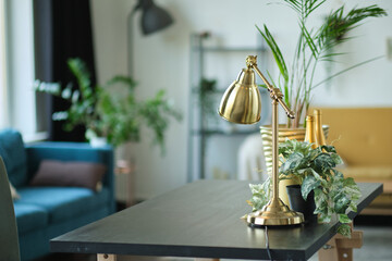 workplace in the living room. Business office desk with gold colors. Modern design. Minimal style.