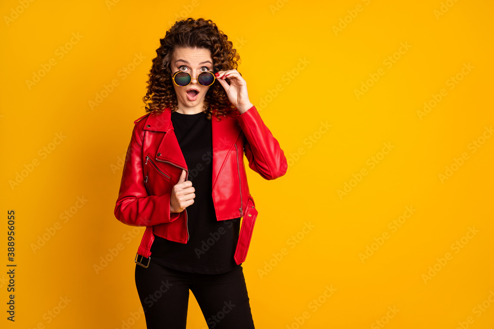 Poster portrait of her she nice attractive amazed wavy-haired girl touching specs reaction isolated on brig