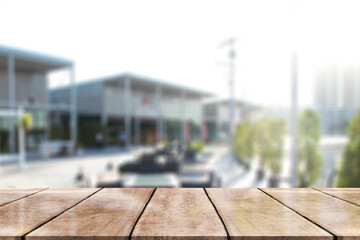 Fototapeta na wymiar Empty wood table on blur restaurant background. 
