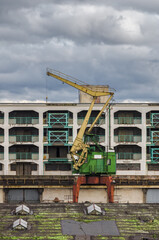 Fototapeta premium HARBOR CRANE - Sea port devices and warehouses
