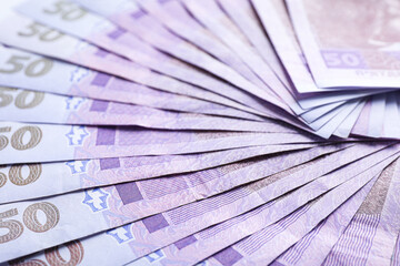 Closeup view of Ukrainian money as background. National currency