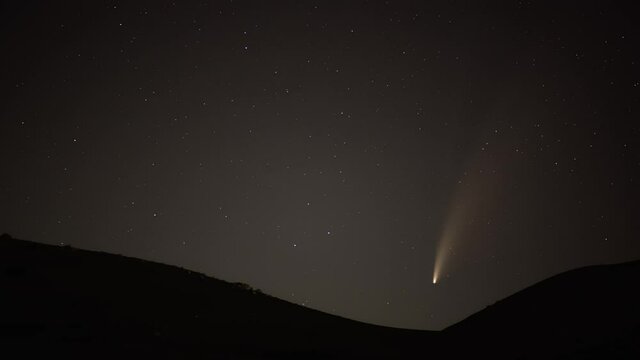 Neowise C 2020 F3 NEOWISE Comet taken over Crimea Nanikovo July 18, 2020 Timelapse footage Comet appears in spiining nitgt skyes over the hills