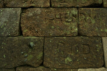 neatly arranged stones which are part of the sukuh temple. brick wall background. brick texture. brick pattern.