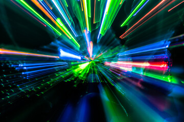 Obraz na płótnie Canvas Defocused Image abstract background of moving colorful lights