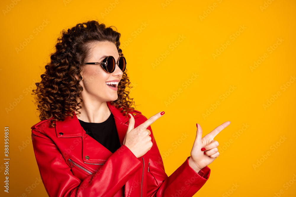 Poster close-up portrait of lovely glad cheery wavy-haired girl demonstrating copy empty blank space isolat