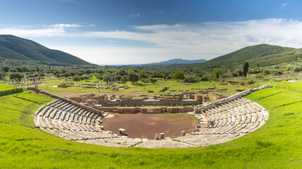Ruins of the theater in the Ancient Messene archeological site, Peloponnese, Greece. One of the best preserved ancient cities in Greece with visible remains dating back further than the 4th century BC