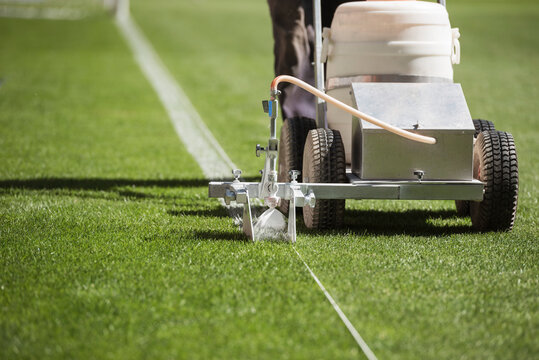 Painting line on a soccer pitch