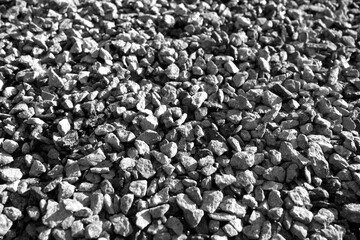 Pile of pebble stones in black and white