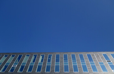 Modern industrial and office building from outside.