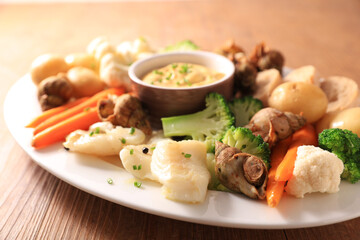 vegetable, fish and dipping sauce