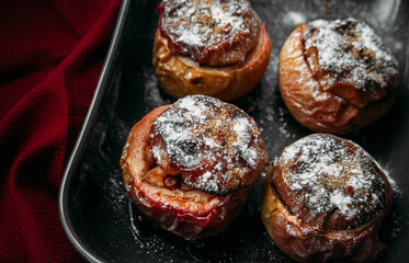Christmas baked apples stuffed with brown sugar, cinnamon and nuts