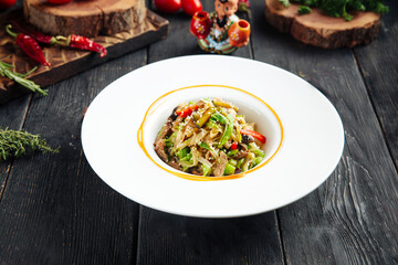 Udon noodles with vegetables and beef