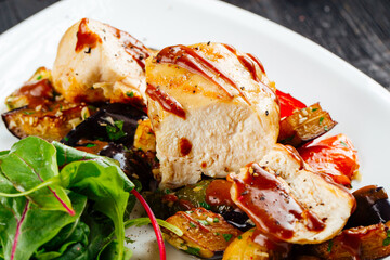 Chicken fillet with sauce and vegetables