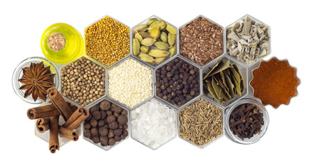 Spices in hexagonal jars isolated on a white background
