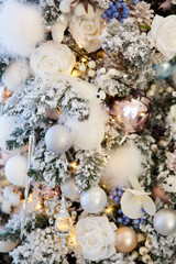 Fototapeta na wymiar Elegant decorated with balls and figures Christmas tree.