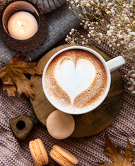 Fototapeta na wymiar Beautiful and romantic autumn composition with cup of coffee