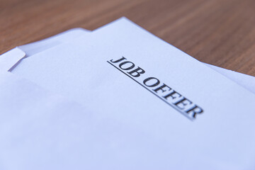 White envelope, containing job offer letter