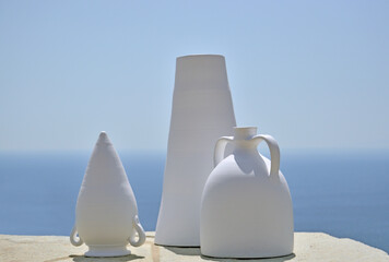 Traditional pottery from Sifnos shot on sea and sky background - obrazy, fototapety, plakaty