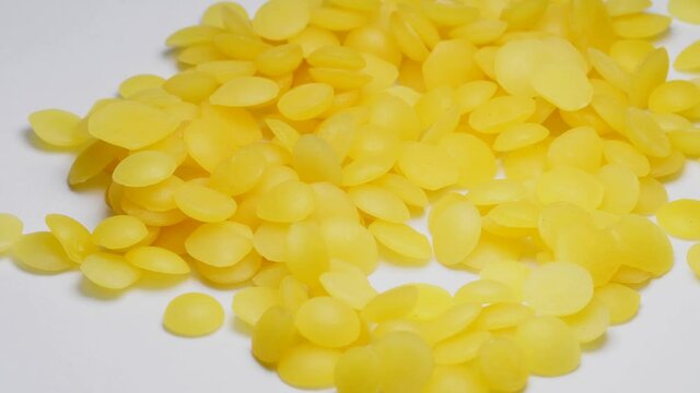 beeswax, pellets on a turn table