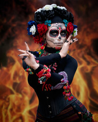 Graceful woman in mask for day of the dead