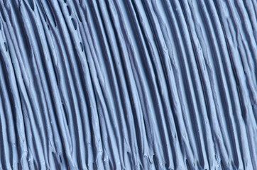 Light blue bentonite facial clay (alginate mask, face cream, body wrap) texture close up, selective...