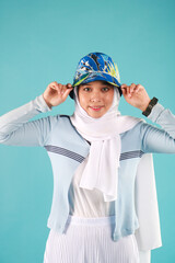 Fashion portrait of young beautiful asian muslim woman with wearing hijab.