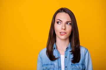 Portrait of minded pensive girl look copyspace bite lips teeth think thoughts wear casual style...