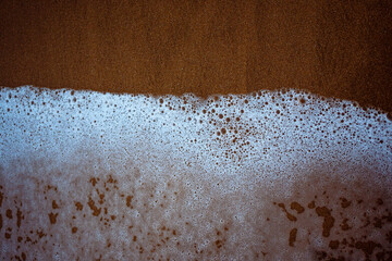 Beautiful beach landscape of the Basque Country Spain. Beach wave textures
