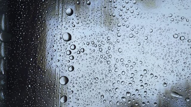 Water droplets on the roof on a rainy day dark