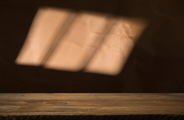 Background with wooden deck table on green grunge background