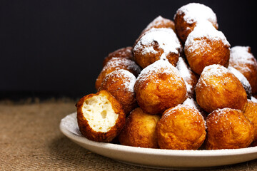 Round donuts in rustic style on a plate